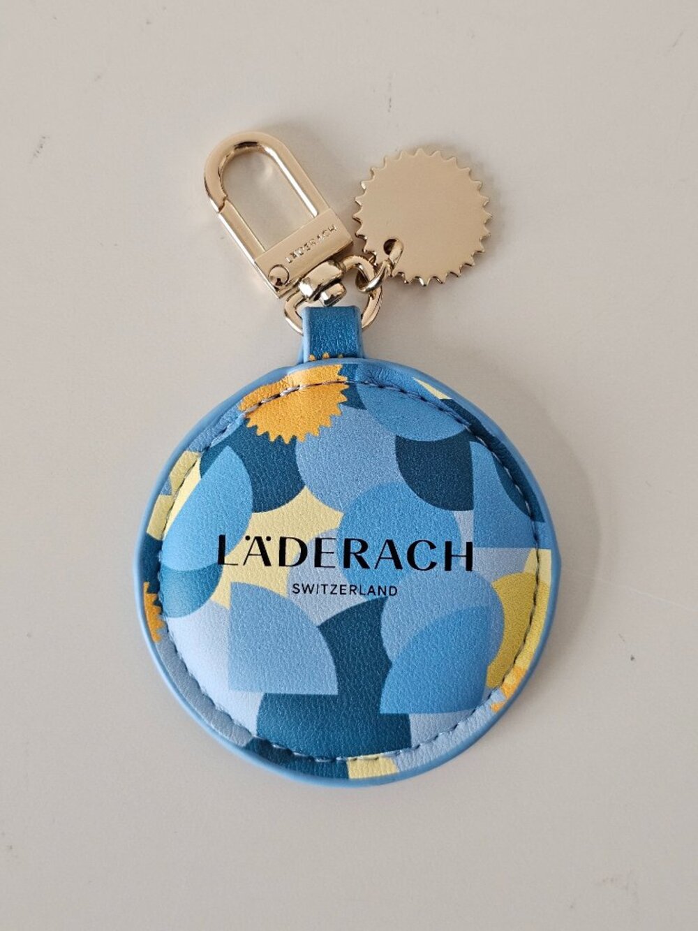 Brand New Laderach Blue Round Geo Print Keychain Charm 2.5" Diameter